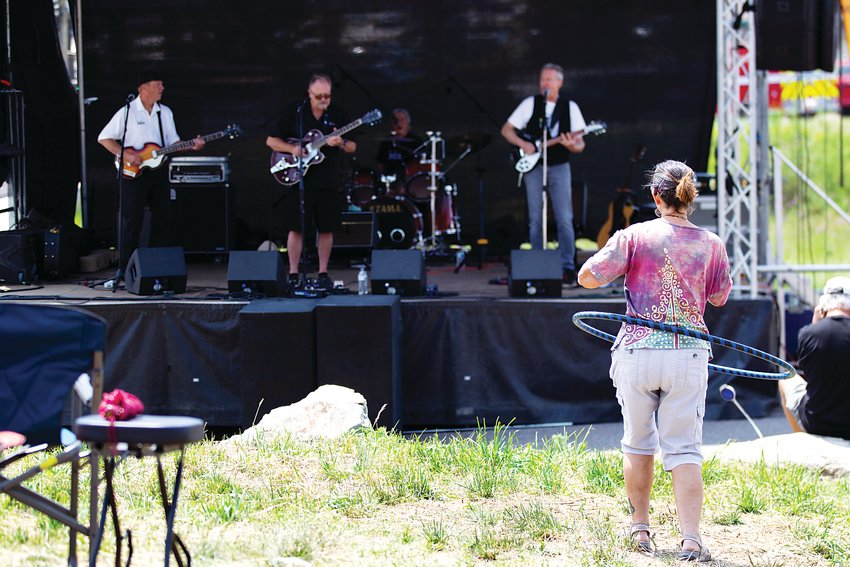 The 3eatles, a Beatles cover band, plays during the Elevation Celebration in Conifer on Sunday.