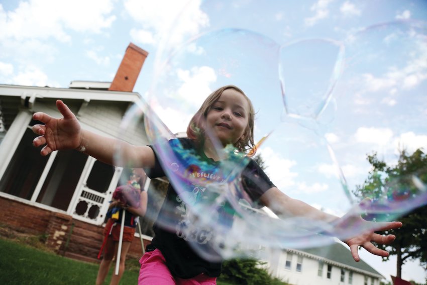 Addie Rose plays with bubbles at this year's Western Welcome Week this August. The return of some, but not all, big summertime community events, was one of the joys of the year.