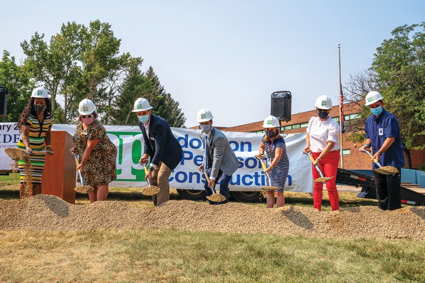 From left, Cherry Creek school board member Angela Garland, Creek school board member Kelly Bates, STRIDE Chief Executive Officer Ben Wiederholt, Horizon Community Middle School Principal Brad Weinhold, Cherry Creek School District Chief Health Officer Michelle Weinraub, Creek school board member Anne Egan and Creek Superintendent Christopher Smith gathered during a ground-breaking ceremony in late August at Horizon Community Middle School in Aurora.