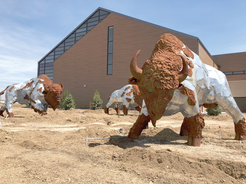 Sculptures titled “Trailblazers” by artist Don Kennell, installed in 2018, stand outside the Bison Ridge Recreation Center. The sculptures are among the public art pieces the Commerce City Cultural Council has helped select.