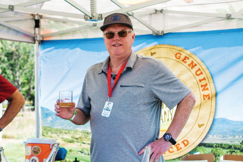 Brad Page of Colorado Cider Company raises a glass to a successful day at Cider Days Hard Cider Tasting.
