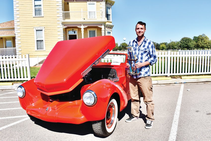 Michael Sparks won a trophy for most unique car, a 1968 Samco Cord convertible. It took him seven years to restore it.