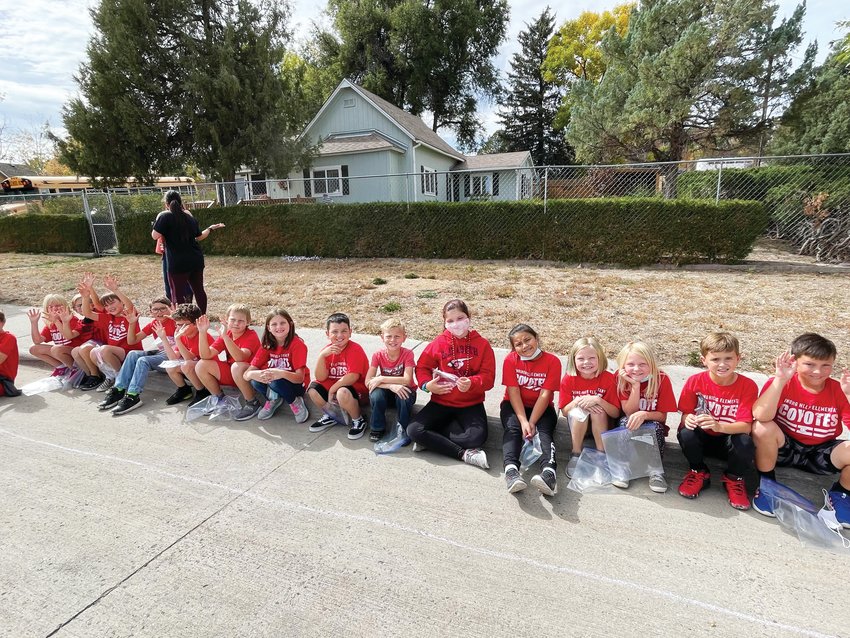 Mrs. Rusk’s 3rd grade class was one of many elementary school classes from around Elizabeth lined up along the route to watch the parade and collect candy.