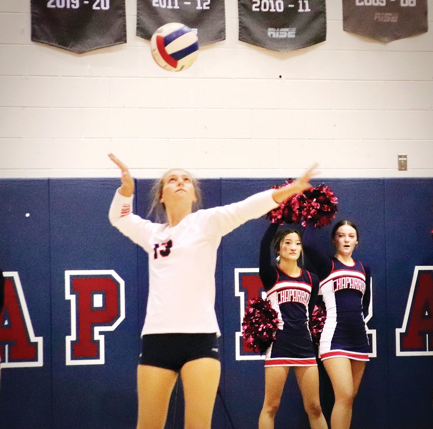 Chaparral’s Afton Thompson (13) delivers a serve during the Oct. 14 match between Chaparral and Legend. The Wolverines captured the Continental League championship with a 3-2 win over the Titans.