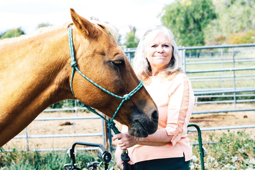 Lifelong horse owner Karen Richard with her horse, Summer.