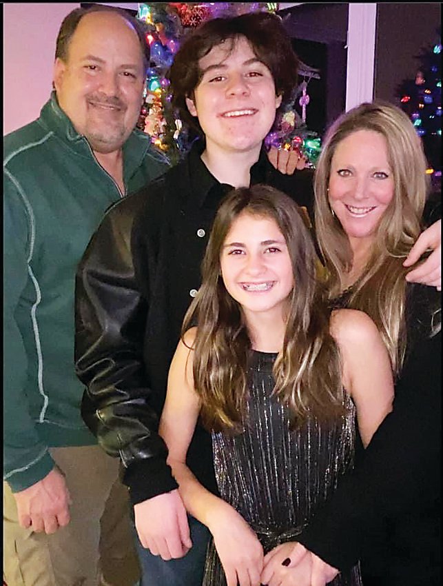 Tom Poholsky with his family: wife Jennifer, son Tommy and daughter Olivia.