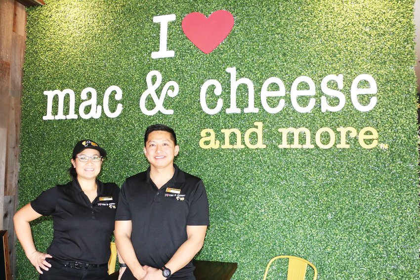General manager Pino Chinnel and owner Vu Tran celebrate the opening of I (heart) Mac &amp; Cheese in Highlands Ranch.