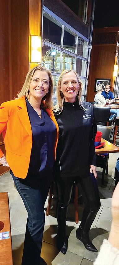 Robyn Carnes, winning candidate for Centennial City Council in the city's far-west District 1, right, poses with Mayor Stephanie Piko, who was unopposed for re-election, at a Carnes campaign event at Hopscotch Taproom Social at The Streets at SouthGlenn on election night, Nov. 2.