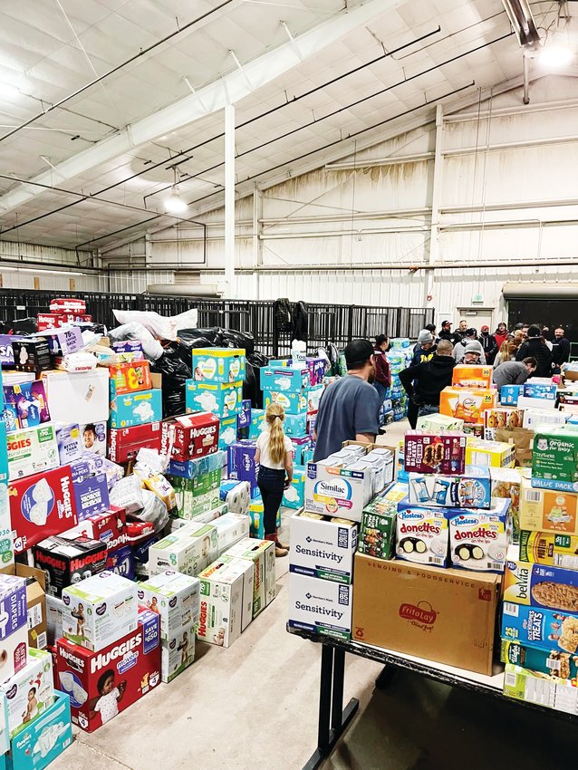 Members of the Dads of Castle Rock collected so many donations that space from the Douglas County Fairgrounds was needed for storage space.