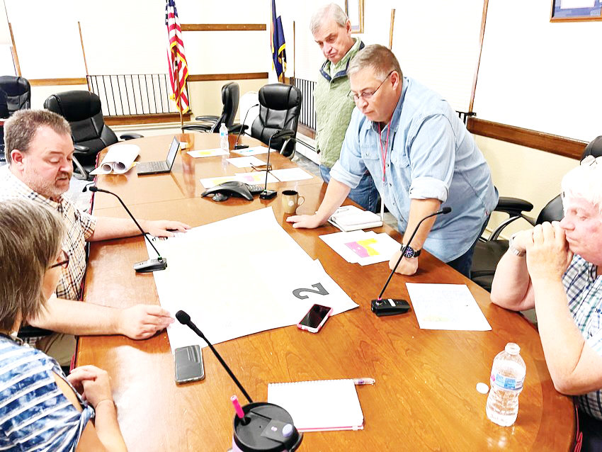 Commissioners sit with leaders from the Elbert County Department of Elections at the Oct. 20 study session. Here they worked to narrow down which maps to choose from. The map they favored at this meeting was ultimately approved by the Commissioners on Nov. 17.