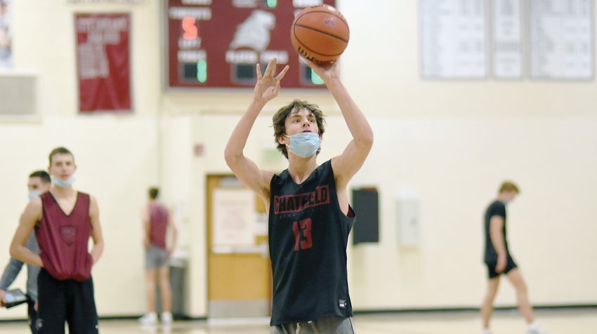 Chatfield senior Parker Teff shoots a free throw during a Chargers’ practice after winter break on Monday, Jan. 3. Teff is one of the top 3-pointer shooters in Class 5A despite being born with Cerebral Palsy.