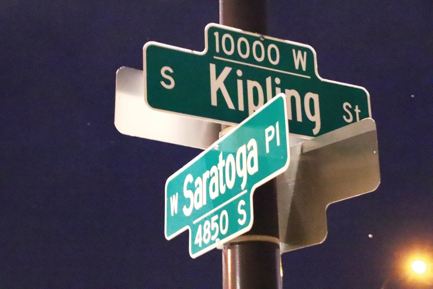 The street signs along Kipling Street — within the City of Denver and just outside Jefferson County — north of Belleview Avenue on Dec. 29. The highest point in the City of Denver sits a short walk away.