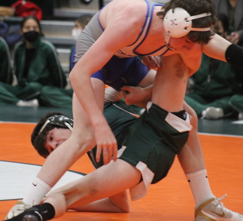 Though Adams City's Jace Long is on the bottom end of this exchange with Poudre's Banks Norby, Long was able to earn a tough, 4-2 decision in the 132-pound match Jan. 12 in Commerce City. The Eagles, the No. 3 team in the state, downed the Impalas, the No. 7 team in the state, by a score of 60-15.