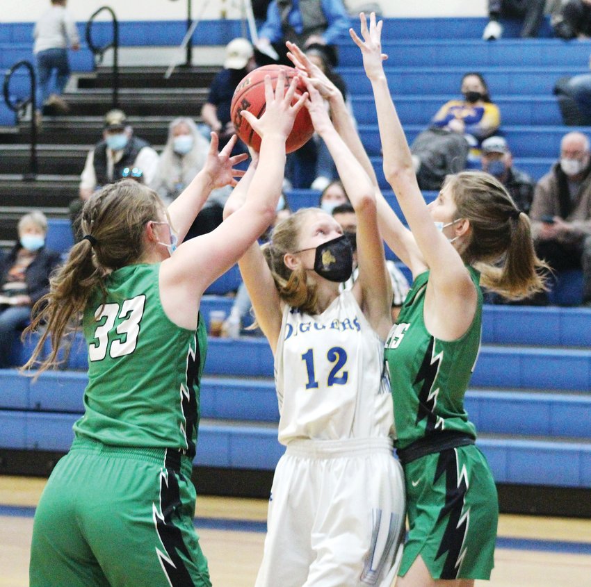 The Byers defense closes in on Clear Creek’s Annika McKown (12) during Clear Creek’s Jan. 15 home game against Byers. The Golddiggers lost 41-32.
