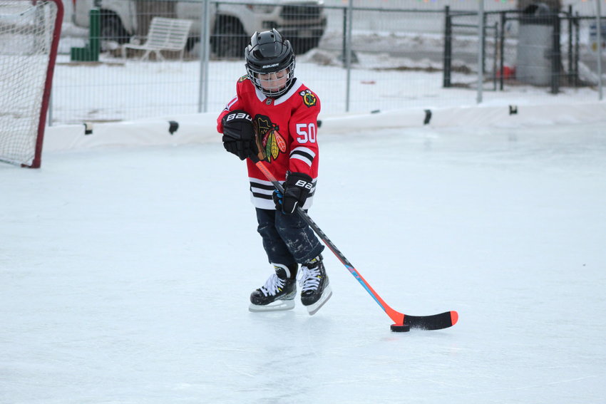 Judah Bernal, 6, practices handling a puck during the Jan. 10 youth hockey skills camp at Georgetown's Werlin Park.