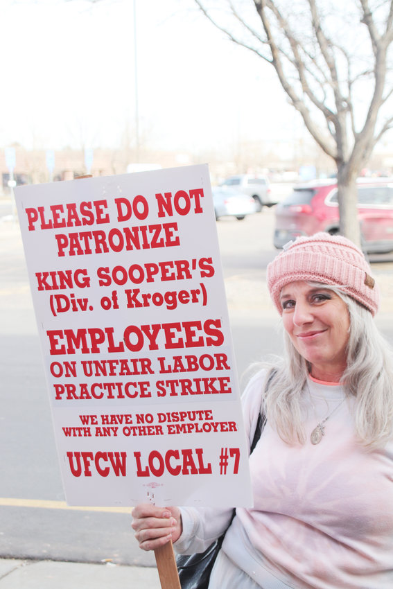 Lori Thomson, a 26 year King Soopers employee and resident of Thornton, protests outside the 10351 N. Federal King Soopers.