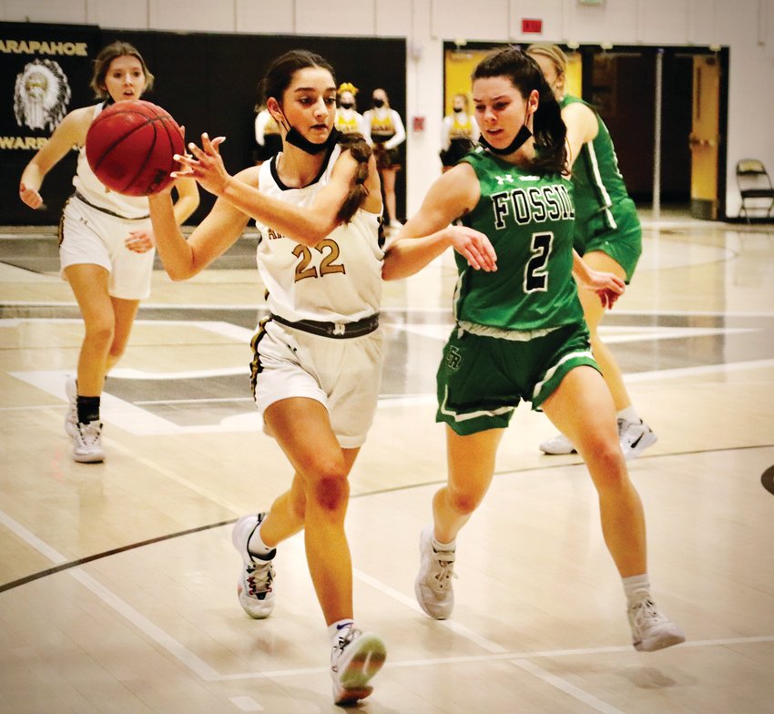 Arapahoe junior Sydney White, 22, connected on six of eight three point attempts and finished with 22 points to help the Warriors notch a 59-46 win over Fossil Ridge on Jan. 11.