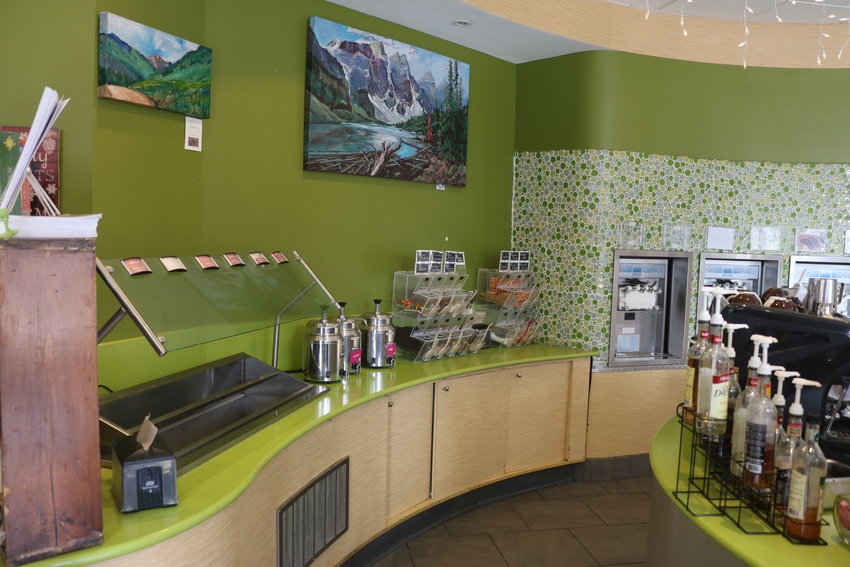 The frozen yogurt topping bar greets guests entering Hearthfire Books and Treats in Evergreen.
