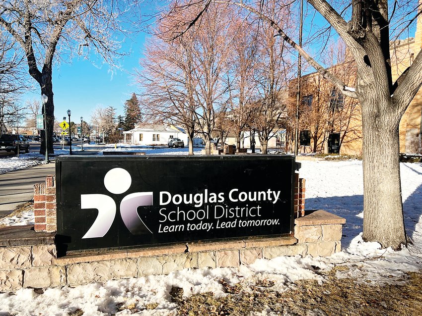 The Douglas County School District's records custodian is being sued for refusing to turn over documents that four school board members received before taking office.