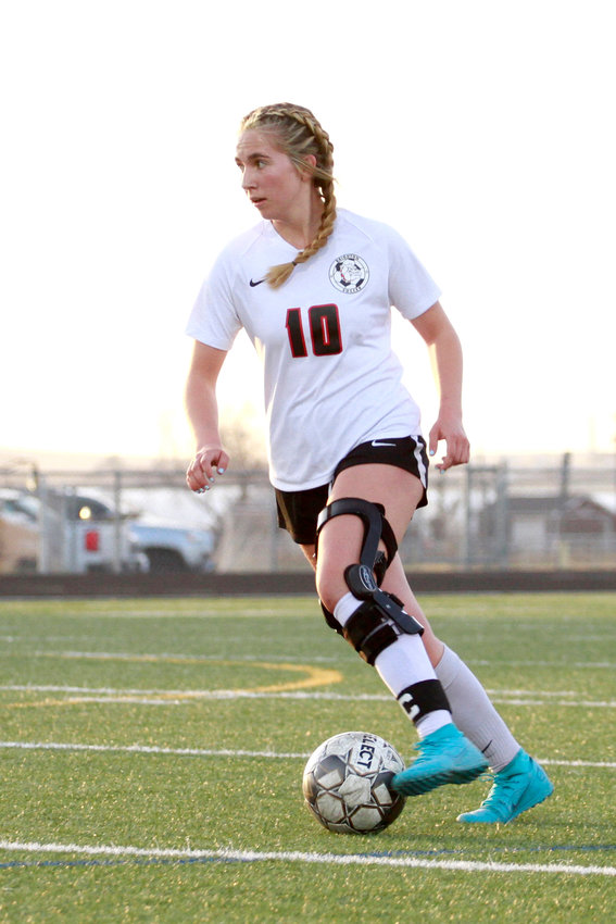 Brighton captain Leah Day dribbles the ball while looking for a teammate against Prairie View. The Bulldogs defeated the ThunderHawks 2-1 April 26.