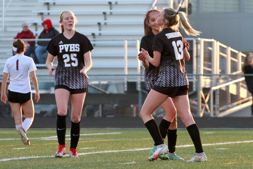 Prairie View's Chloe Gray (13) celebrates her goal off a penalty kick with her teammates Cienna Rush (9) and McKinsey Poulson (25) as they took the lead against Brighton in the first half. Brighton came from behind and defeated the ThunderHawks 2-1 in their league match April 26.