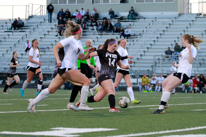 Prairie View's Elle Haas dribbles towards goal and takes on multiple Brighton opponents during her league match. The Bulldogs defeated the ThunderHawks 2-1 April 26.