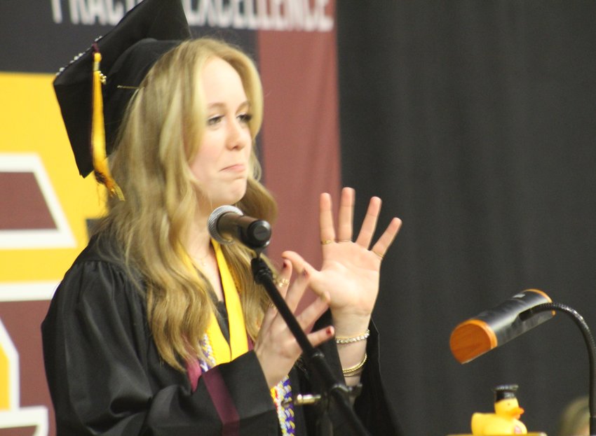 Eagle Ridge Academy student Mackenzie Crawford encourages her class, "Don't be afraid to take responsibility for your mistakes. Small things in life are great happiness," during the school's commencement program at the University of Northern Colorado on May 18.