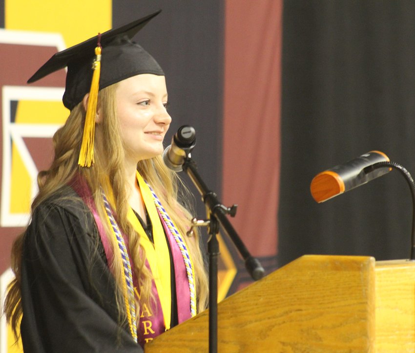 ERA student Mackenzie Crawford encourages her class, "Don't be afraid to take responsibility for your mistakes. Small things in life are great happiness," during the ERA commencement program at the University of Northern Colorado May 18.