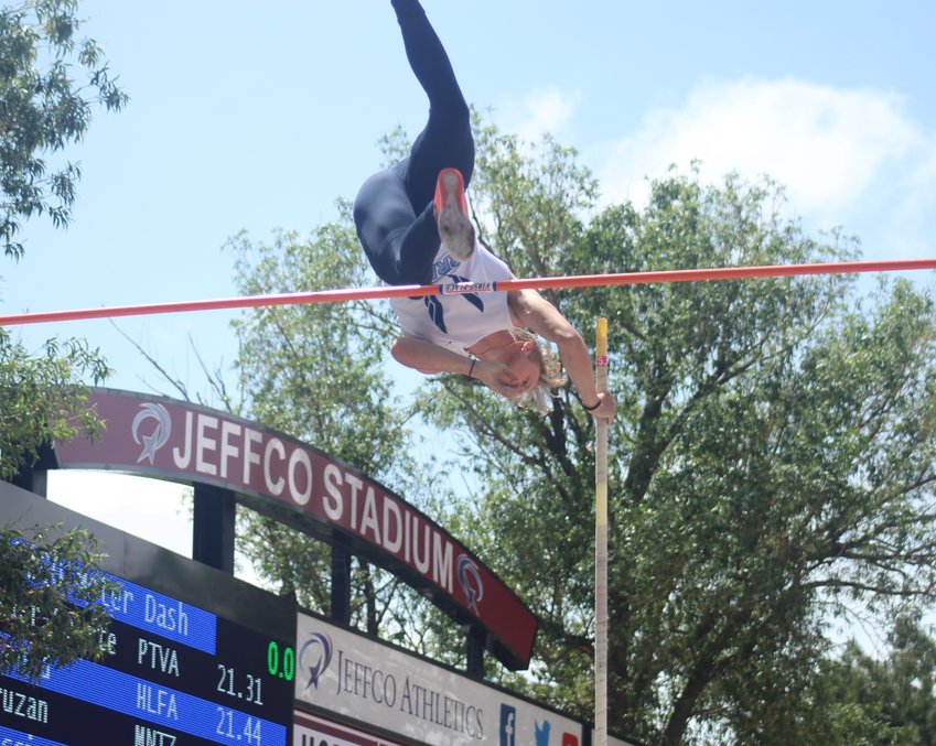 Riverdale Ridge's Lucas Couron is atop the bar and wound up atop the heap at the state 4A boys pole vault championships May 22 at Jeffco Stadium.