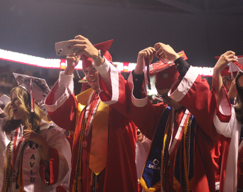 Over go the tassels, a prelude to the tossing of the mortarboards as Brighton High School's Class of 2022 prepares for what awaits its members. The commencement program was May 25 at 1stBank Center in Broomfield.