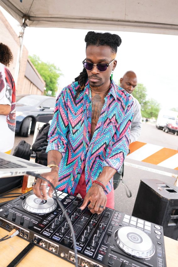 A DJ performs at last year’s Juneteenth Music Festival. This year’s event, which takes place June 18 and 19, features block parties with DJs between 25th and 29th streets in Denver’s Five Points neighborhood. Story on page 7