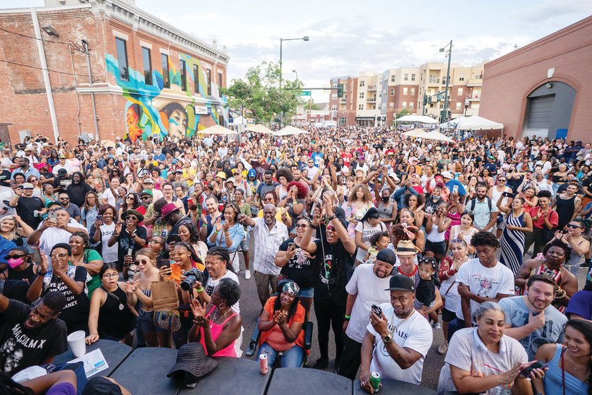 A crowd of people gather at the stage during last year’s Juneteenth Music Festival. Headliners for the 2022 Juneteenth Music Festival are Dave East on June 18 and Twista on June 19.