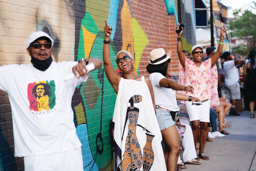 A group of people dance at the 2021 Juneteenth Music Festival. The event this year takes place June 18 and 19 in Denver’s Five Points neighborhood.