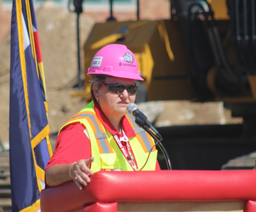 Brighton High School principal Shelly Genereux delivers remarks during the groundbreaking for BHS' new STEM and CTE Center Aug. 12.