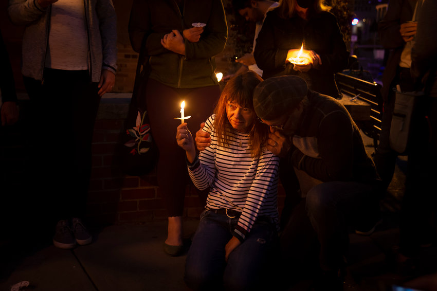 Drawing comfort from the community, Sally Glass remembers her son, 22-year-old Christian Glass during a Sept. 20 candlelight vigil in Idaho Springs. Christian was shot June 11 by police in the neighboring town of Silver Plume after he had called 911 for assistance when his vehicle got stuck on a rural road.