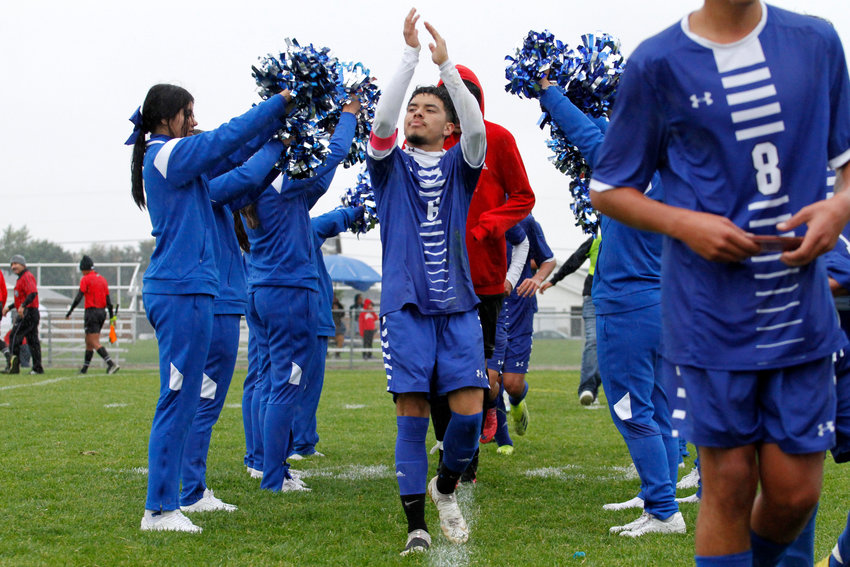 Jonathan Gonzalez celebrates a Frontier League win with his teammates and fans against The Pinnacle Sept.21 in Fort Lupton. Gonzalez scored three goals and had an assist against the Timberwolves.