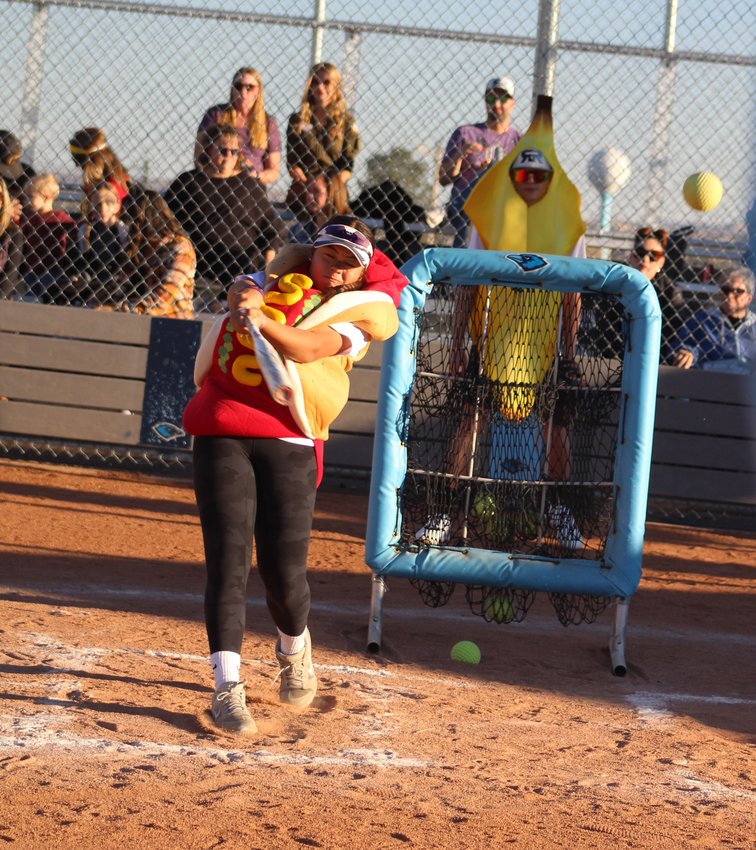 Riverdale Ridge's Zioe Linville takes her swings Oct. 31 on her school's softball field.