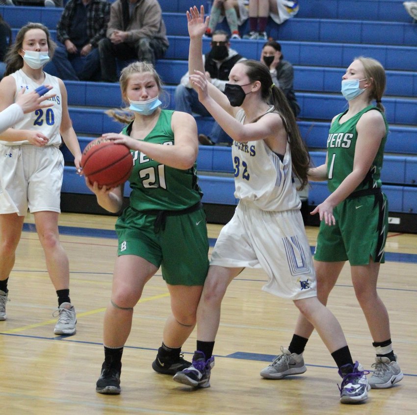 Clear Creek's Sami Zebroski (32) defends Byers' Annette Earl (21) during the Jan. 15 basketball game at Clear Creek.