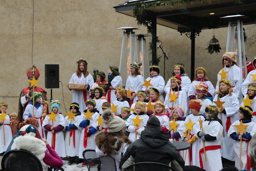 The Santa Lucia Children's Procession sang Christmas carols for the crowd.