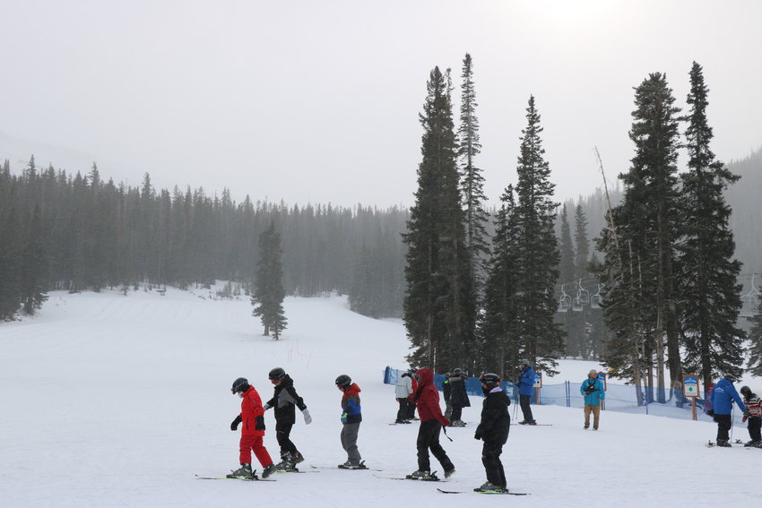 Loveland saw flurries all day while the kids skied.