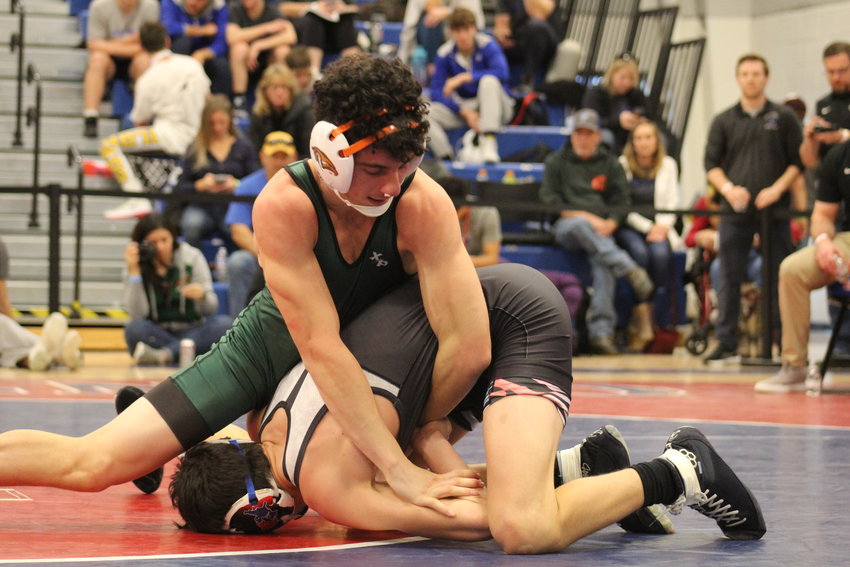 Adams City's Miguelito Salazar controls the action against Grandview's Gunner Lopez during a first-round, 132-pound match at the Top of the Rockies tournament at Centaurus High School Jan. 20. Lopez won by pinfall in 3:49.