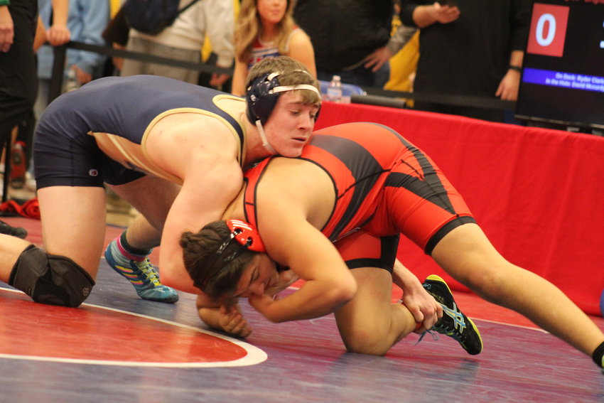 Legacy's Quinn Funk is on his way to a first-period pin of Brighton's Sean Rundgren in the opening round of 190-pound matches at the Top of the Rockies tournament Jan. 20. Fun placed third in his weight class.