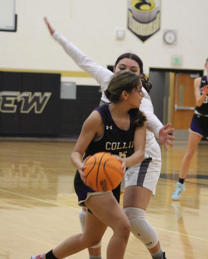 Prairie View's Amber Jansen puts the defensive clamps on Fort Collins' Iiyssas Silhasek during the team's game Jan. 20 in Brighton.