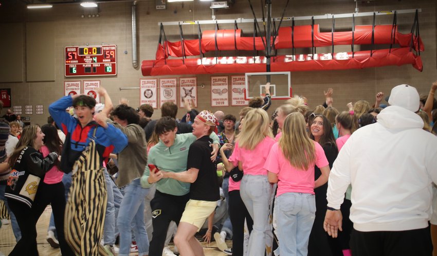 Rock Canyon fans swarm the court after the win.