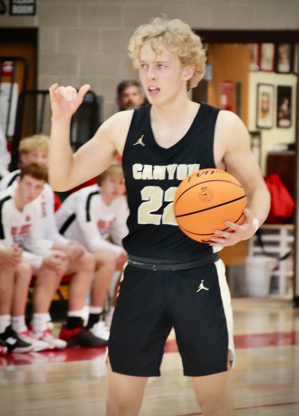 Rock Canyon’s Gavin Hershberger (22) had 13 points in the Jaguars 59-57 win over Regis Jesuit on Jan. 20. Mac Terry hit the winning basket just before time ran out.