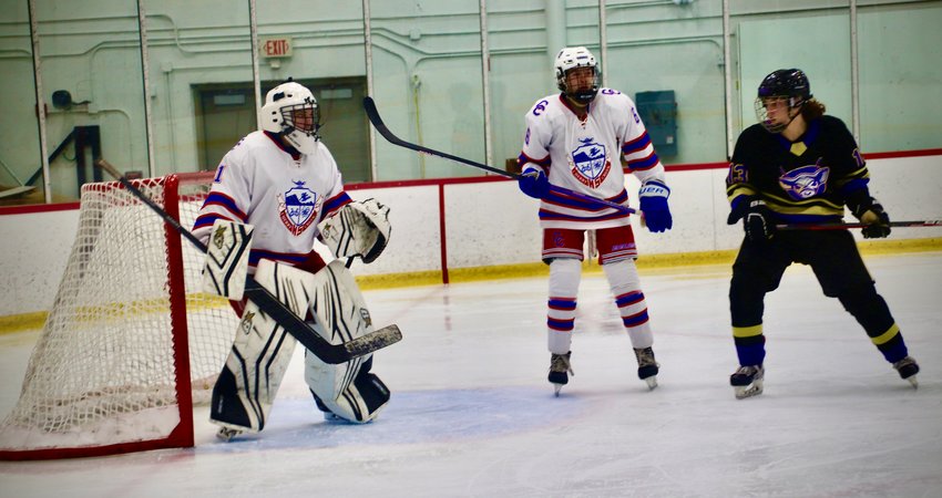 Freshman Cherry Creek goalie Mason Banks waits for approaching players during the Jan. 21 game against Fort Collins. Banks, making his first varsity start, got a 4-3 win.
