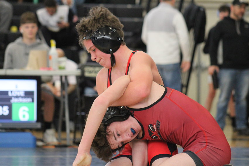 Brighton's Alex Eversman tries to turn Loveland's Sam Jackson durin a 113-pound, first-round match at the Front Range League wrestling tournament Jan. 28. Jackson earned the win by a score of 7-5.