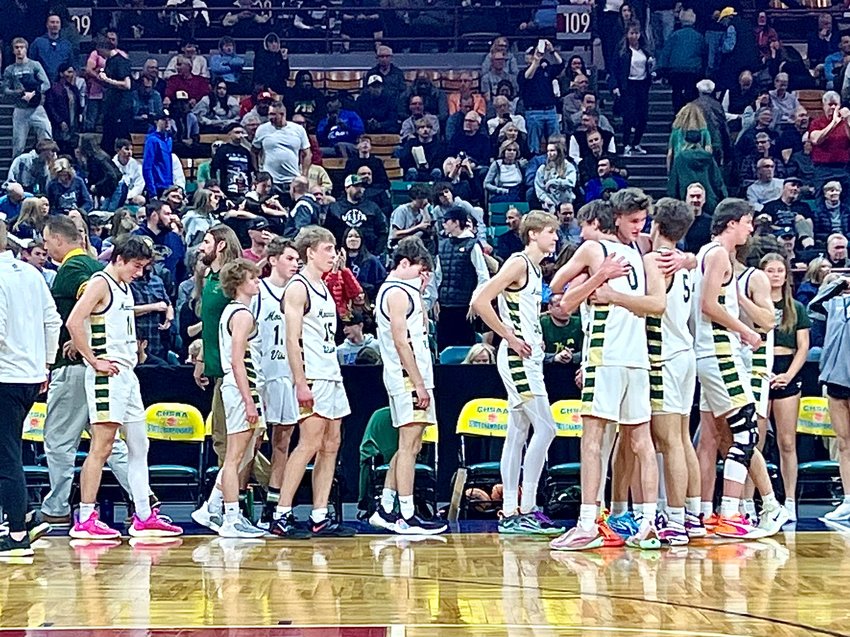 Mountain Vista boys take a moment after a loss to Denver EAst in the playoffs.