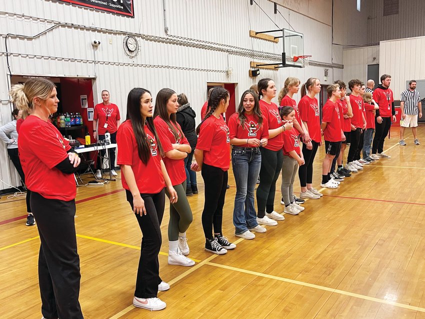 Player mentors line up to greet the unified players as they enter the court in the Elizabeth Middle School gym on Feb. 22.