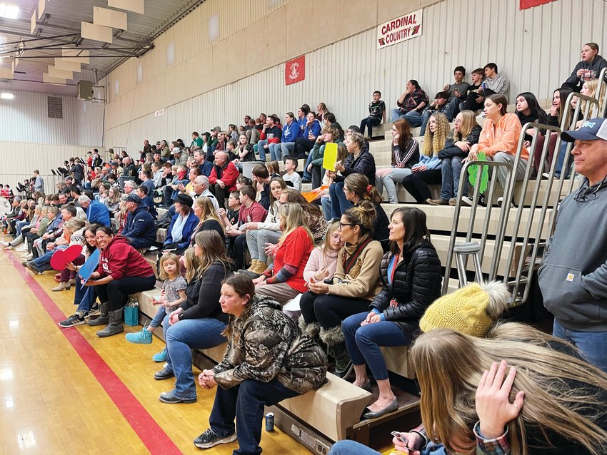 Attendees pack the stands in the Elizabeth Middle School gym for the unified basketball game.